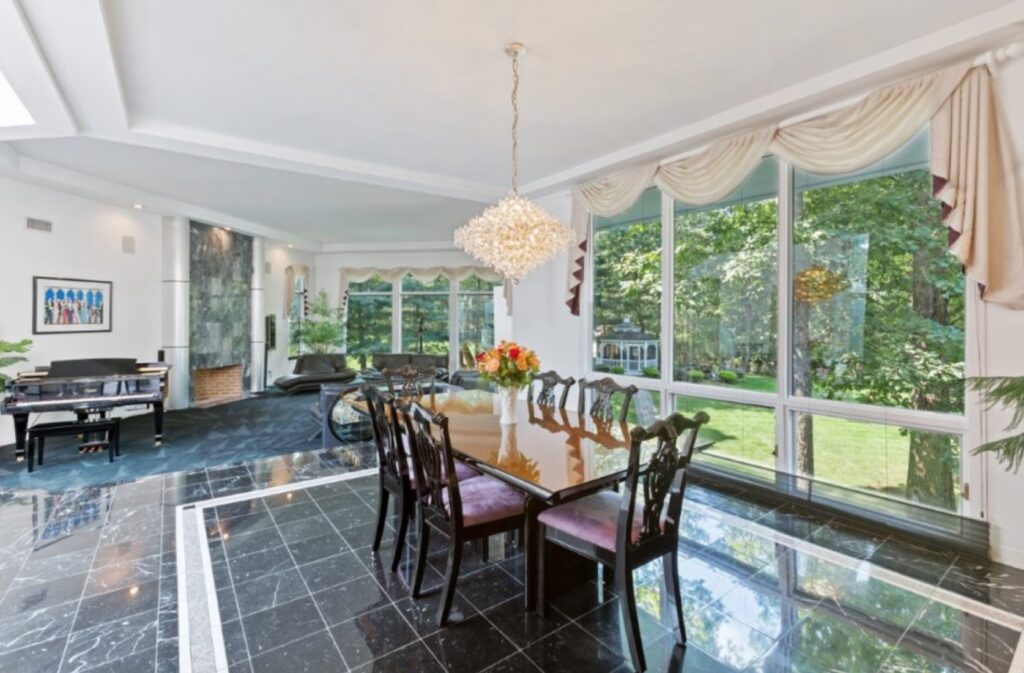 The dining room at Gloria Gaynor's home is bright and reflects the classy style of the beloved musical artist - Elliman photo